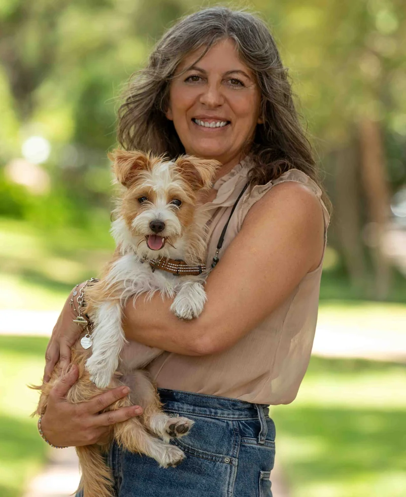 Elena Di Stefano, SEO Content Manager at SEO Impact Pros, holding her dog Lola