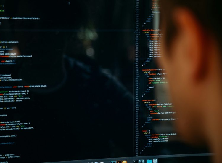 Developer coding during website reconstruction services project