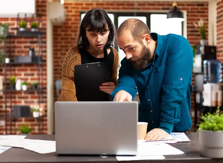 Two experts collaborating on link building services strategy in Houston