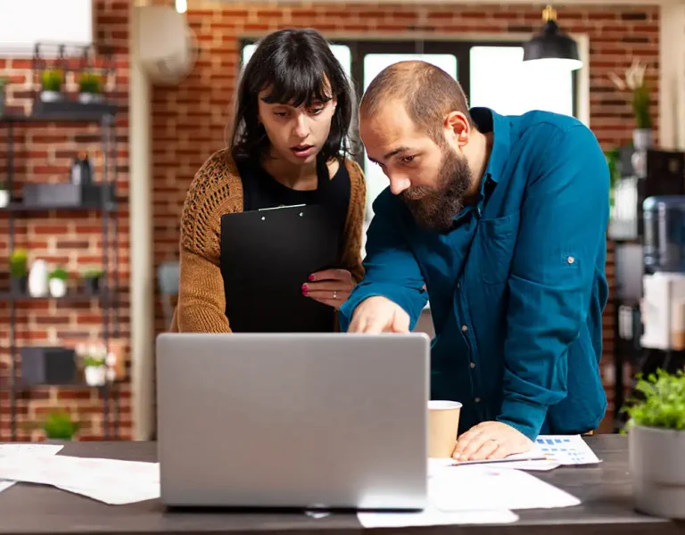Two experts collaborating on link building services strategy in Houston